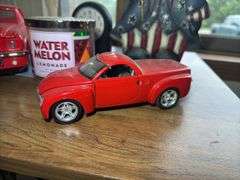 Mixed Collection: Uncle Sam Figure, Ford Mustang, Clock, Candle, and Figurine