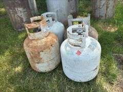 Four Assorted Propane Tanks