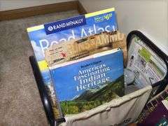 Books, Doll, and Miniature Rocking Chair