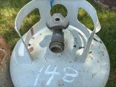Four Assorted Propane Tanks