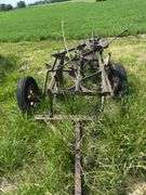 John Deere 3 bottom pull type plow, spoke wheels