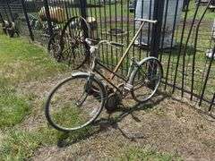 Hiawatha Gambles Bike and Lawn Mower
