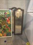 Two Framed Mirrors and an Xcaret Riviera Maya Cancun Poster