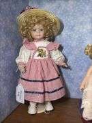 Three Collectible Porcelain Dolls