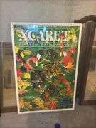 Two Framed Mirrors and an Xcaret Riviera Maya Cancun Poster