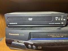 Panasonic PV-8450 VCR, Magnavox DVD Player, and Remotes