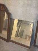 Two Framed Mirrors and an Xcaret Riviera Maya Cancun Poster