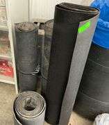 Heavy aluminum castings and rolls of rubber.