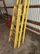 Two Yellow Step Ladders