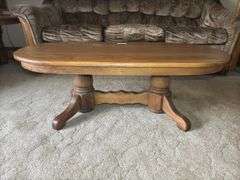 Oval Wooden Coffee Table with Pedestal Base