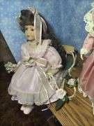 Collection of Three Porcelain Dolls with Accessories