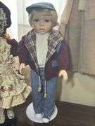 Pair of Decorative Porcelain Dolls - Boy and Girl