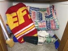 Contents of Closet: Linens, Pillows, Games, & More