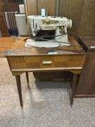 Singer Sewing Machine with Cabinet