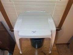End Table with Shelf, Plastic Stool, and Planter