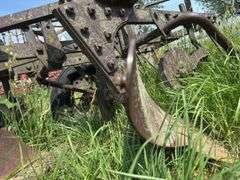 John Deere 3 bottom pull type plow, spoke wheels