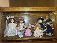 Collection of 7 Dolls