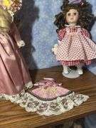 Collection of Three Porcelain Dolls with Accessories
