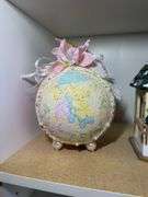 Two Decorative Figurine Balls and House