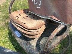 Metal Bucket, Tractor Seats, Chair, and Chainsaws
