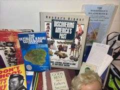 Books, Doll, and Miniature Rocking Chair