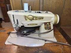 Singer Sewing Machine with Cabinet