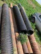 Assorted Metal and Plastic Drainage Pipes
