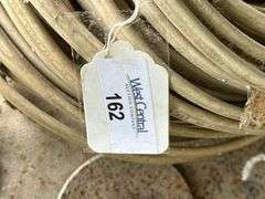 Farm Salvage Lot with Electrical Wire and Shovel