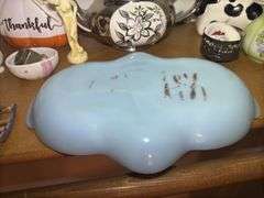 Shelf of Various Decorative Items and Fire King Dish