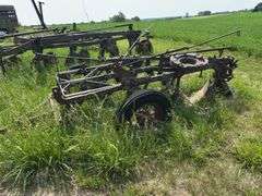 John Deere 3 bottom pull type plow, spoke wheels