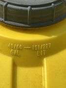 Two 60 Gallon Yellow Ace Roto-Mold Sprayer Tanks and One Plastic Barrel
