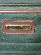 Adolfo Duxbury & Samsonite Luggage with Curtain Rods, and ironing board
