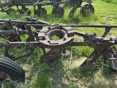 John Deere 3 bottom pull type plow, spoke wheels