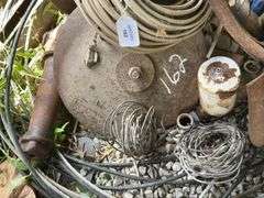Farm Salvage Lot with Electrical Wire and Shovel