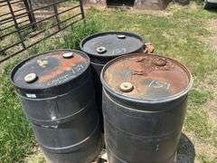 Three 55-Gallon Plastic Drums with Calcium Chloride.
