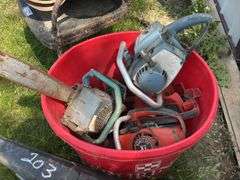 Metal Bucket, Tractor Seats, Chair, and Chainsaws
