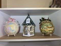 Two Decorative Figurine Balls and House