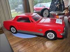 Mixed Collection: Uncle Sam Figure, Ford Mustang, Clock, Candle, and Figurine
