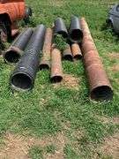 Assorted Metal and Plastic Drainage Pipes