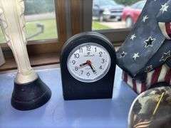 Mixed Collection: Uncle Sam Figure, Ford Mustang, Clock, Candle, and Figurine
