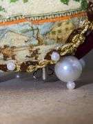 Two Decorative Figurine Balls and House