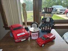 Mixed Collection: Uncle Sam Figure, Ford Mustang, Clock, Candle, and Figurine