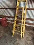Two Yellow Step Ladders