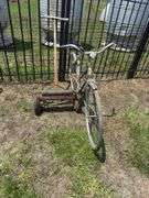 Hiawatha Gambles Bike and Lawn Mower