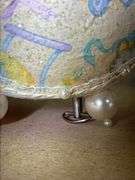 Two Decorative Figurine Balls and House