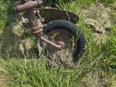 John Deere 3 bottom pull type plow, spoke wheels