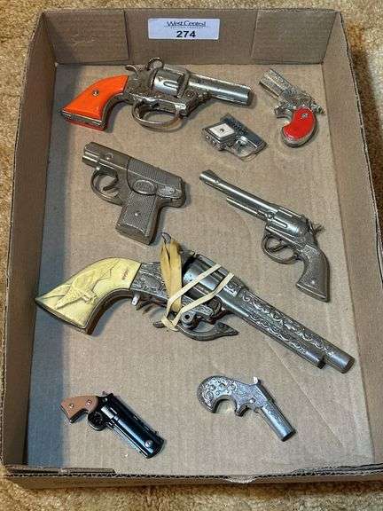 Toy Cap Guns: Gene Autry, American, Pet, Hubley, & Leslie Henry Red Gripped Derringer, Toy Pistol Lighter, and Toy Pistol Knife image