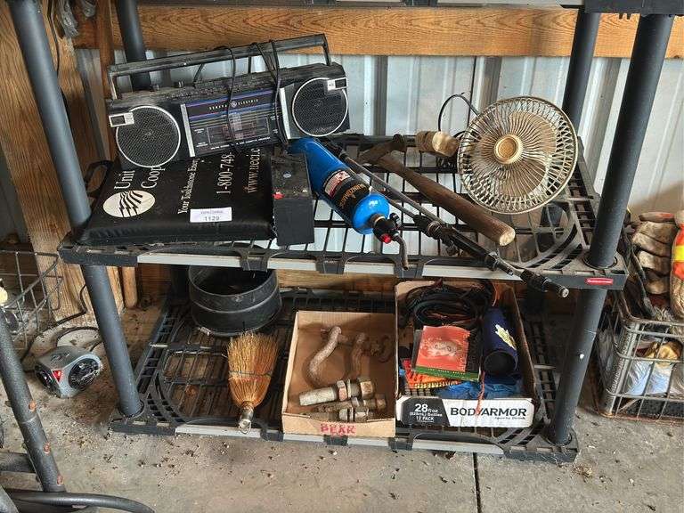 Contents of shelf with Boombox, Tools, and Household Items image