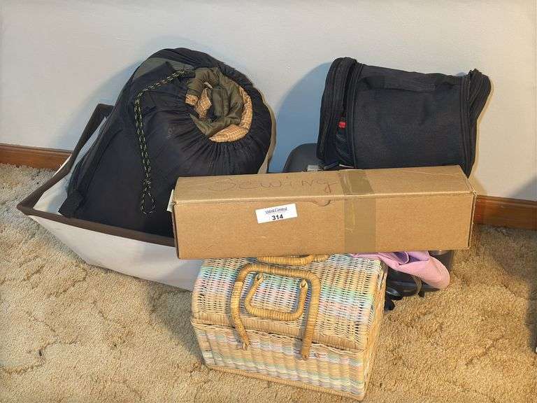 Sleeping Bag, American Tourister Cosmetic Case, Sewing Kit and More image