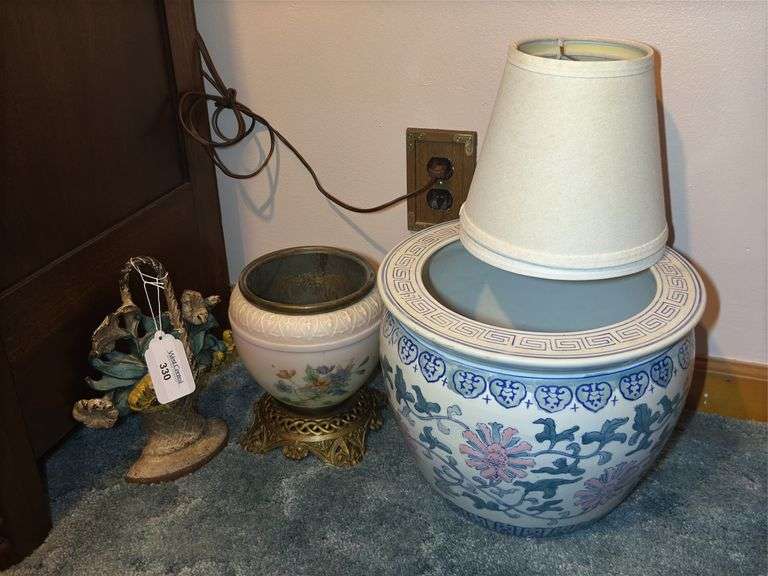 Floral Decorated Planter, Lamp Shades, and Cast Iron Door Stop image